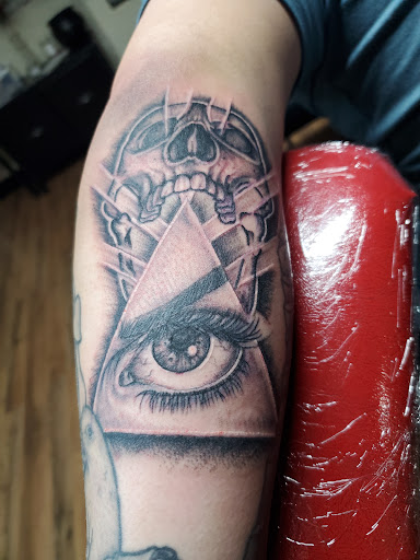 Explore side tattoo ideas for guys, creative tattoo ideas in Sparks, available at Shades of Gray Tattoo Studios