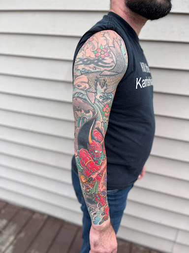 Explore leg tattoo cover up ideas, creative tattoo ideas in Pikeville, available at Sacred Mountain Tattoo