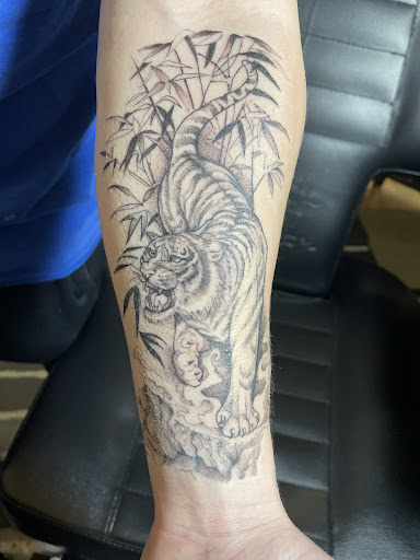 Explore magician tattoo ideas, creative tattoo ideas in Renton, available at Rum Thai Tattoo