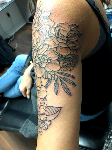 Explore flash sheet tattoo ideas, creative tattoo ideas in Wake Forest, available at Revelation Ink Tattoo and Piercing