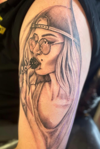 Find small cat tattoo ideas for your next unique tattoo in Maple Lake at Earth Child Tattoo
