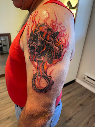 Explore fighting tattoo ideas, creative tattoo ideas in Elko, available at Freedom Tattoo