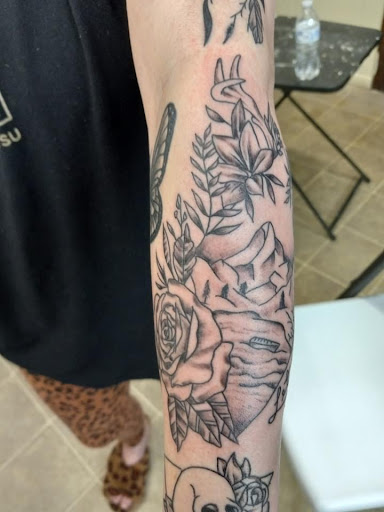 Explore mid arm tattoo ideas, creative tattoo ideas in Spencer, available at Youngs Tattoo