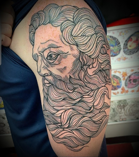 Explore mens shoulder tattoo ideas, creative tattoo ideas in Willow Grove, available at Tattoo GalaxyWillow Grove Piercing & Tattoos