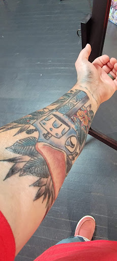 Explore swan tattoo ideas, creative tattoo ideas in Madisonville, available at Sugg Street Tattoo