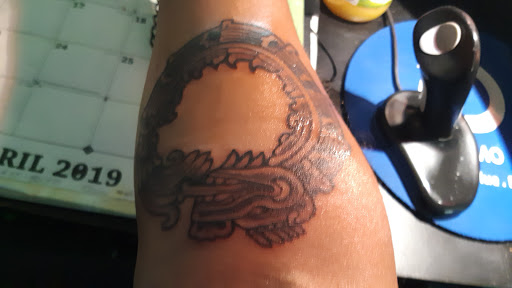 Explore tattoo ideas on calf, creative tattoo ideas in Durham, available at Tattoo Asylum