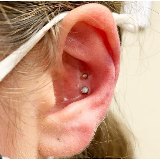 Explore puzzle tattoos ideas, creative tattoo ideas in Summerville, available at Exotic Impressions Body Piercing