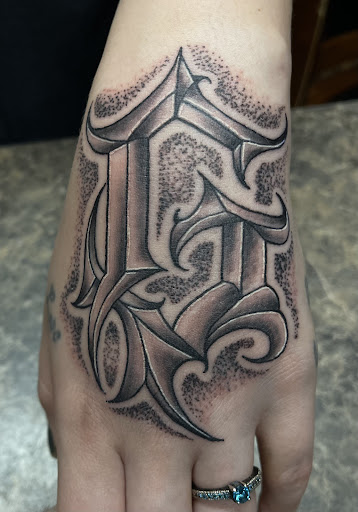 Explore bear paw tattoo ideas, creative tattoo ideas in Auburn, available at Black Lantern Tattoo Gallery