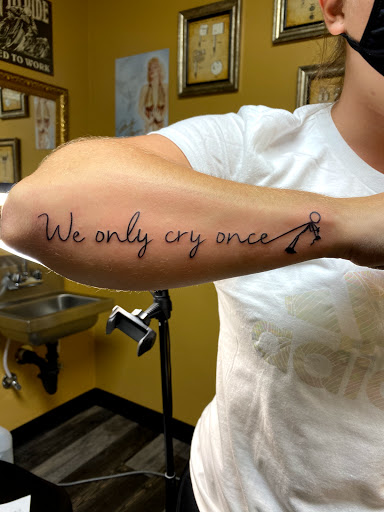 Explore tattoo ideas for lost loved ones, creative tattoo ideas in Warner Robins, available at Untold Pain Tattoo Studio