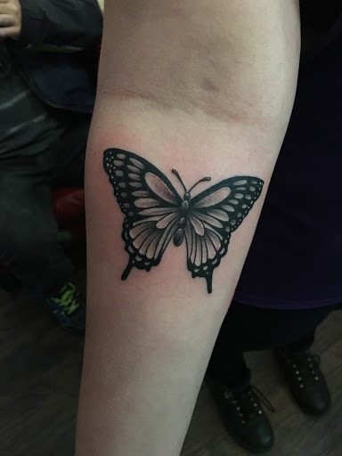 Explore deadpool tattoo ideas, creative tattoo ideas in Kingsford, available at Deft Tattoo Studio