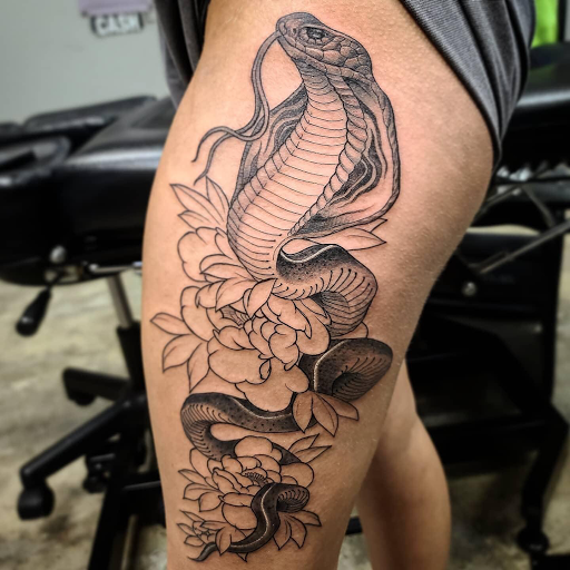 Explore neck tattoo ideas guys, creative tattoo ideas in Kenosha, available at Kenosha Tattoo Company