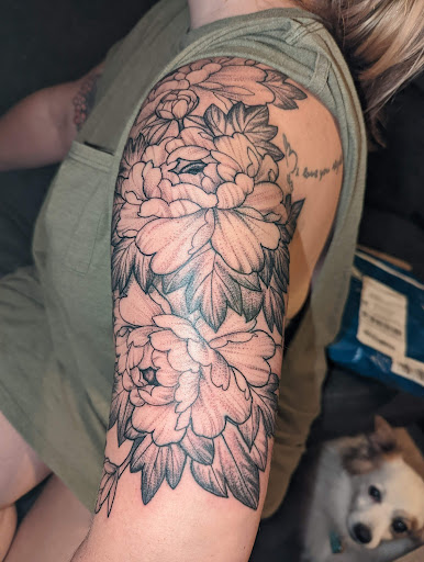 Explore penguin tattoo ideas, creative tattoo ideas in Cincinnati, available at Wisteria Piercing & Tattoo