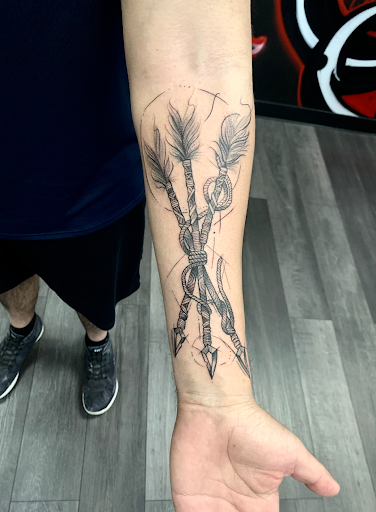 Explore tattoo ideas for women's lower back, creative tattoo ideas in Silver City, available at Independent Ink Tattoo