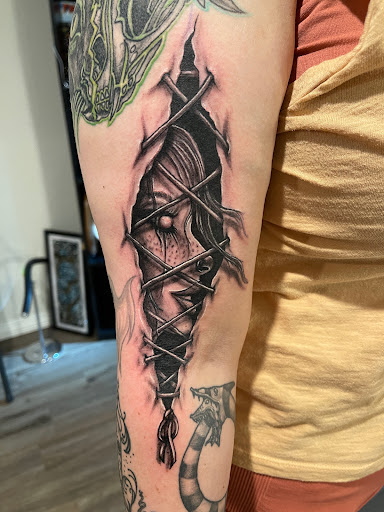Explore urban tattoo ideas for men, creative tattoo ideas in Elko, available at Freedom Tattoo