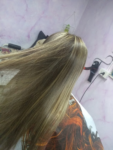 Teléfono de Peluquería Lila
