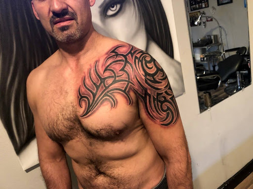 Explore mens ring tattoo ideas, creative tattoo ideas in Ontario, available at Blvd Ink So Cal