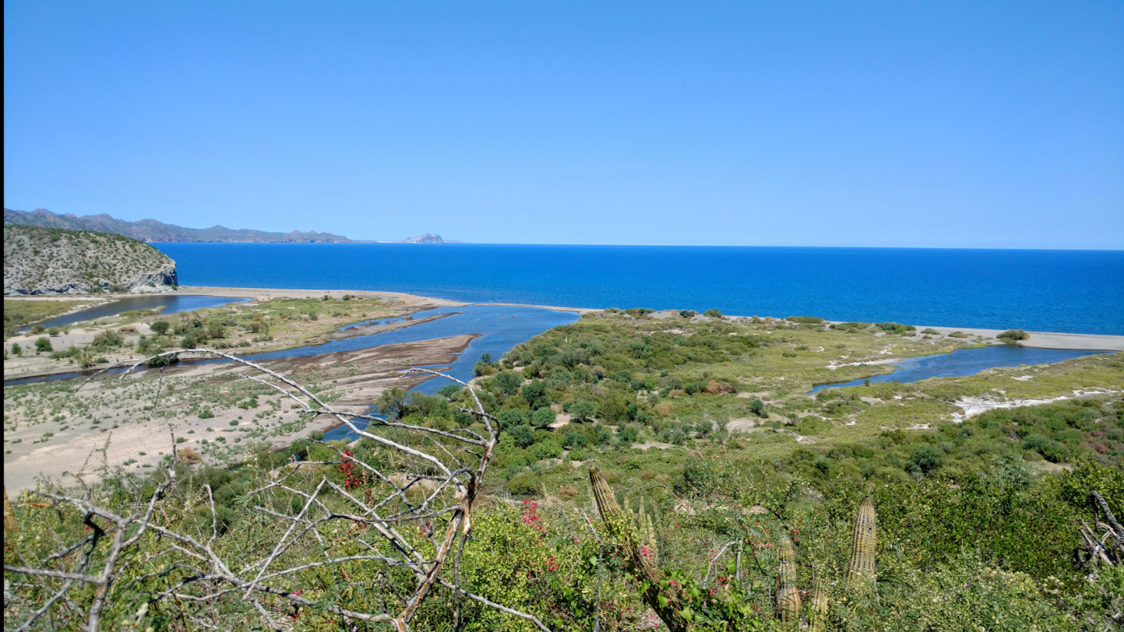 Playa San Juaniquito的照片 带有轻质沙和卵石表面