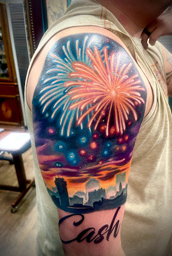 Explore mens tricep tattoo ideas, creative tattoo ideas in Wichita, available at Addictions In Ink