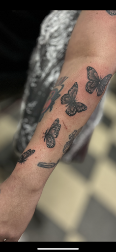 Explore tattoo ideas for nephew, creative tattoo ideas in Demotte, available at Revelations Tattoo Parlor