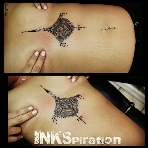 Explore dog paw tattoo ideas, creative tattoo ideas in Rochester, available at Timeless Tattoo & Piercing