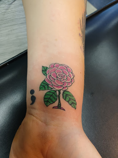 Explore tattoo ideas for athletes, creative tattoo ideas in Owosso, available at Twisted ink tattoo