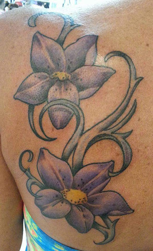 Tattoo Shop «Attitudes Muskegon», reviews and photos, 1610 Evanston Ave, Muskegon, MI 49442, USA