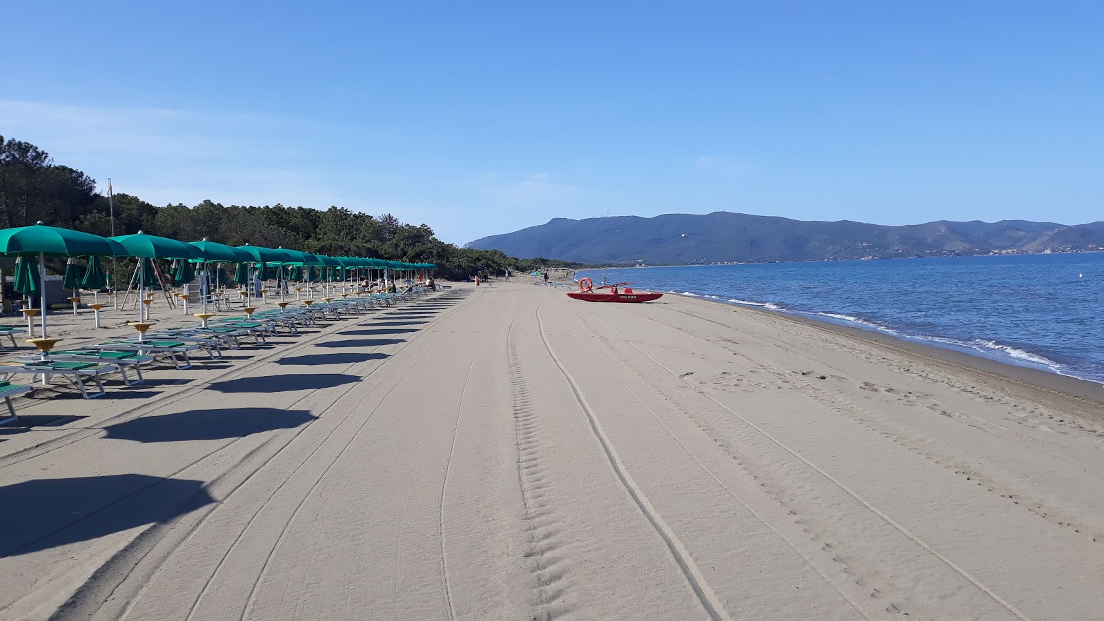 Foto di Spiaggia Florenzo con una superficie del sabbia marrone