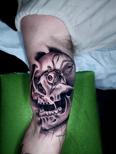 Find tattoo ideas under breast for your next unique tattoo in College Station at Legacy Tattoo Lounge