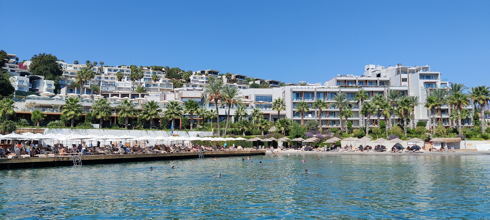 Fotografie cu Mirada Exclusive Bodrum Beach cu o suprafață de nisip beige