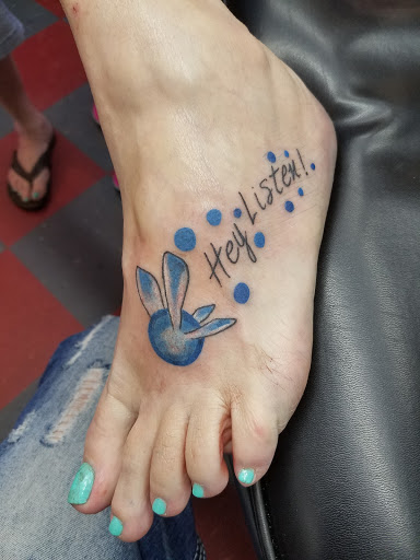 Explore back neck tattoo ideas, creative tattoo ideas in Oxford, available at Opus Land Tattoo co.