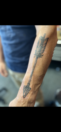 Explore red ink tattoo ideas for guys, creative tattoo ideas in Brentwood, available at Ink Addiction