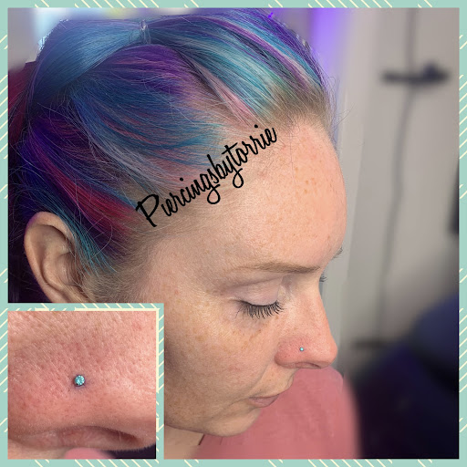 Explore heart locket tattoo ideas, creative tattoo ideas in Fort Walton Beach, available at Piercings by Torrie