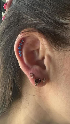 Explore hand name tattoo ideas, creative tattoo ideas in Brandon, available at Pinup Tattoo Studio