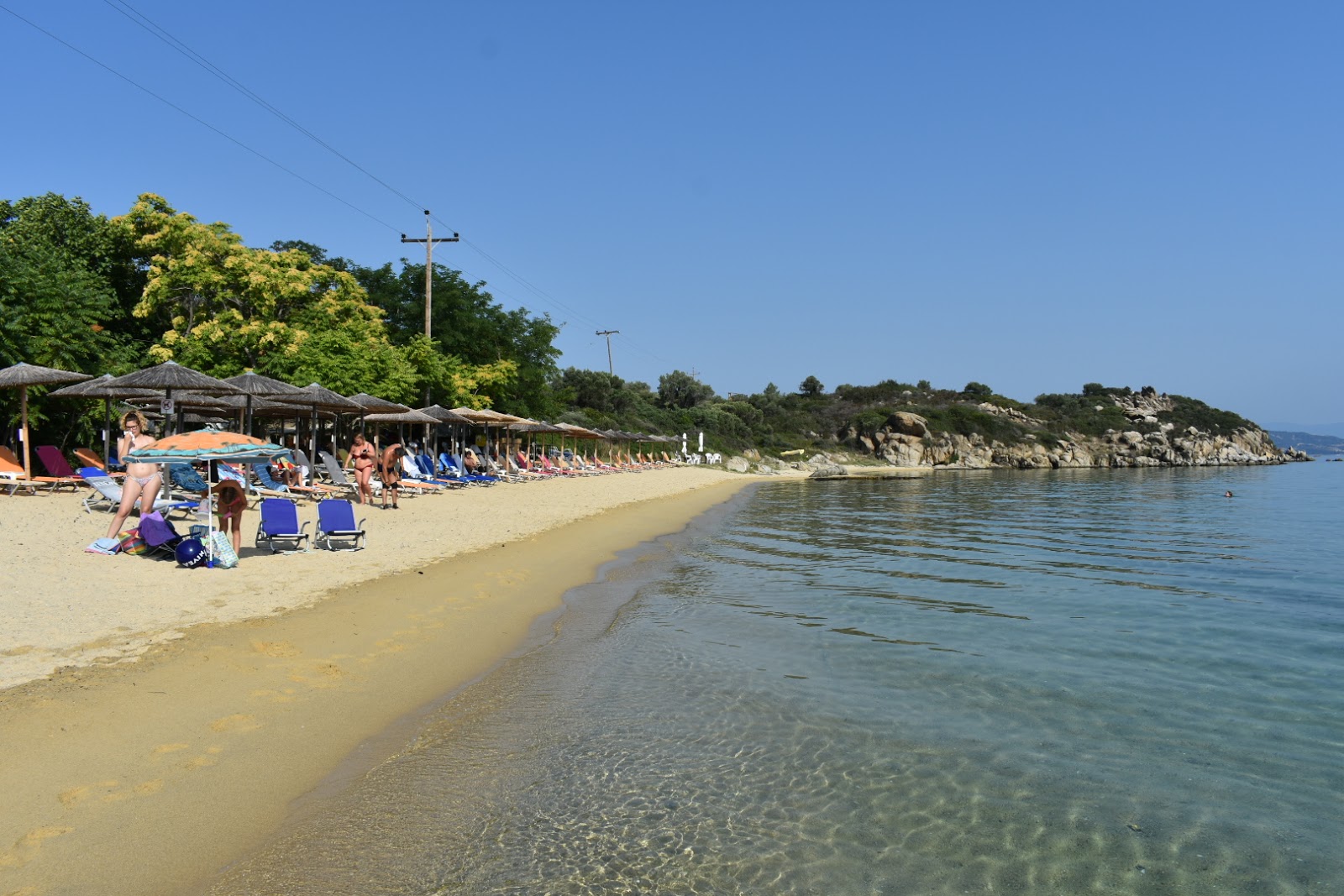 Foto van Agios Georgios Strand met gemiddeld niveau van netheid