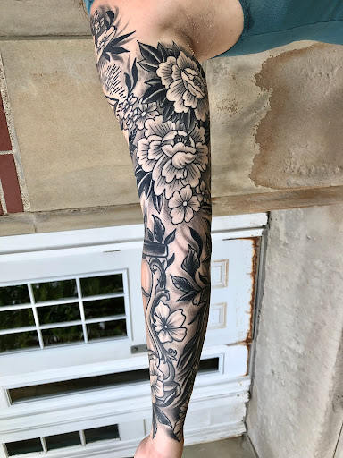 Explore rose tattoo ideas for females, creative tattoo ideas in Mount Pleasant, available at Goos Tattoo Shop