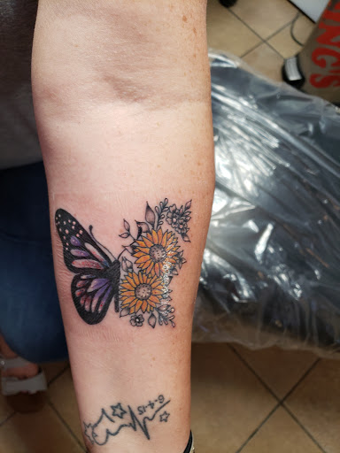 Explore back tattoo ideas for women, creative tattoo ideas in Elko, available at Custom Tattoos and Body Piercing Studio