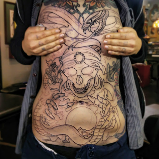 Explore leg tattoo ideas with meaning, creative tattoo ideas in Dekalb, available at Proton Tattoo