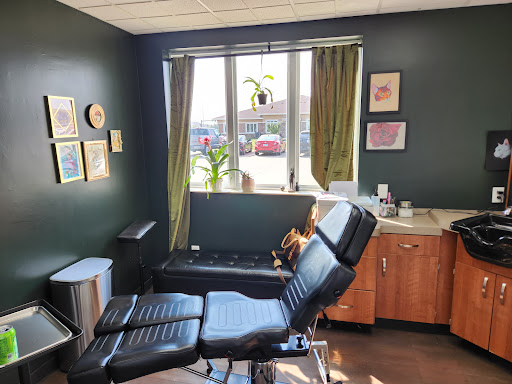 Explore black tattoo ideas for men, creative tattoo ideas in Fargo, available at Devils Workshop Tattoos LLC