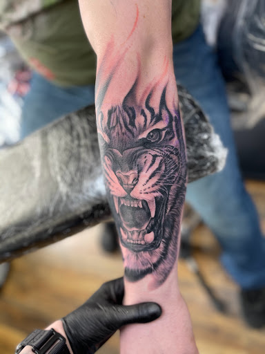 Explore inside finger tattoo ideas, creative tattoo ideas in Huntington, available at Golden Dagger Tattoos and Piercings