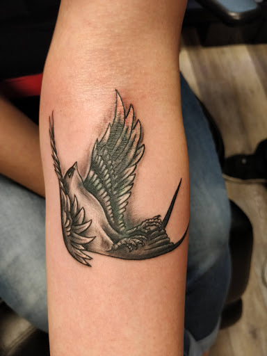 Explore cool hand tattoo ideas, creative tattoo ideas in Hanover, available at Gypsy Skull Tattoo