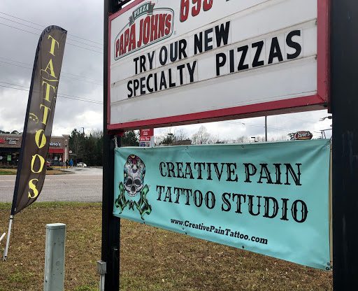 Find male tattoo ideas shoulder for your next unique tattoo in Meridian at Creative Pain Tattoo Studio
