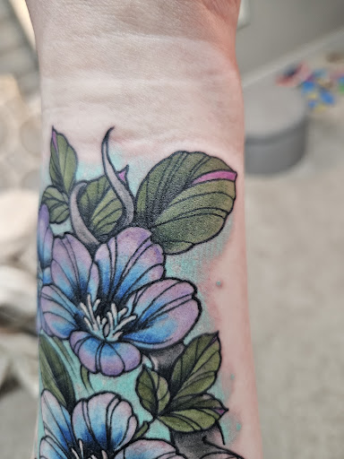 Explore hell hound tattoo ideas, creative tattoo ideas in Omaha, available at Ironwood Ink