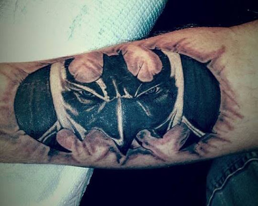 Explore kaws tattoo ideas, creative tattoo ideas in Mansfield, available at Artful Impressions Tattoo and piercing studio
