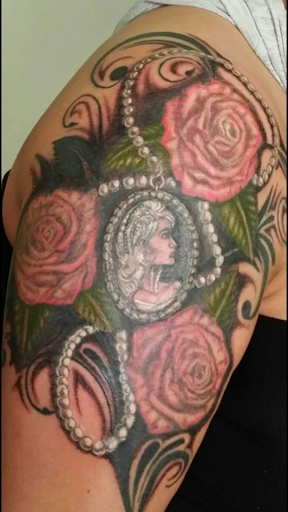 Explore knee scar tattoo ideas, creative tattoo ideas in Anchorage, available at Unique Ink AK