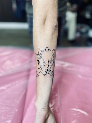 Explore rave tattoo ideas, creative tattoo ideas in Lake City, available at Crooked Spines Tattoo Studio