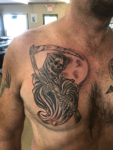 Explore rib tattoo ideas men, creative tattoo ideas in Madison Heights, available at Sin on skin tattoo and piercing