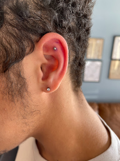 Explore daughter portrait tattoo ideas, creative tattoo ideas in Palm Harbor, available at Angry Owl Tattoo and Piercing