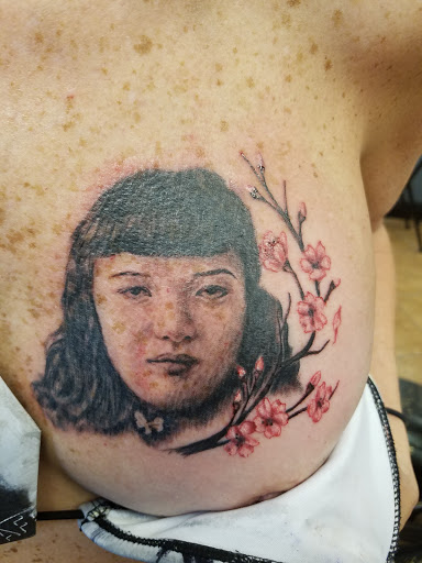 Find unique best friend tattoo ideas for your next unique tattoo in Longmont at Roskos Ink