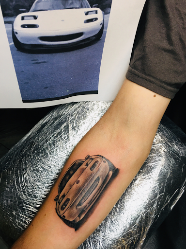 Explore vintage halloween tattoo ideas, creative tattoo ideas in Warner Robins, available at Untold Pain Tattoo Studio