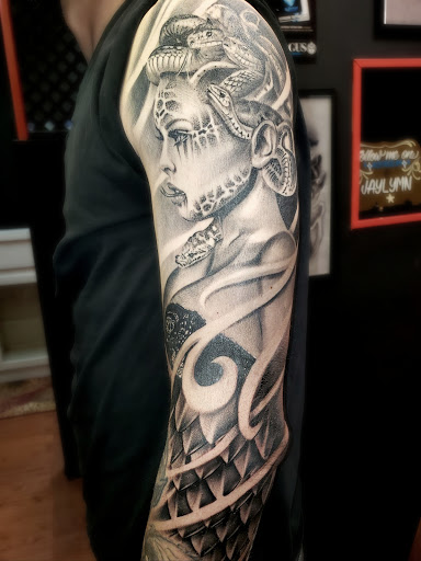 Explore tattoo ideas for 4 sisters, creative tattoo ideas in Monroe, available at Vivid Art Tattoos